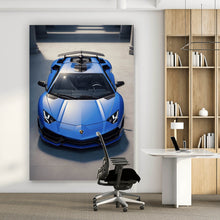Lade das Bild in den Galerie-Viewer, Leinwandbild Blauer Sportwagen in Frontansicht geparkt Hochformat