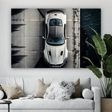 Lade das Bild in den Galerie-Viewer, Leinwandbild Elegantes Auto auf Brücke mit Wasser im Hintergrund Querformat