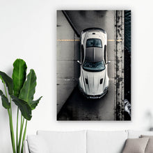 Lade das Bild in den Galerie-Viewer, Acrylglasbild Elegantes Auto auf Brücke mit Wasser im Hintergrund Hochformat