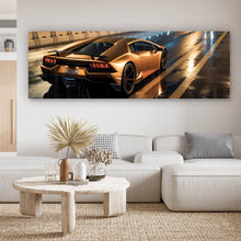Lade das Bild in den Galerie-Viewer, Leinwandbild Goldener Sportwagen auf nasser Straße bei Nacht Panorama