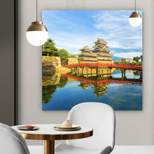 Lade das Bild in den Galerie-Viewer, Leinwandbild Historische Burg mit roter Brücke und Wasserreflektion Quadrat