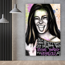Lade das Bild in den Galerie-Viewer, Acrylglasbild Junge Frau zeigt rebellische Geste Hochformat