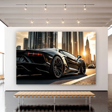 Lade das Bild in den Galerie-Viewer, Aluminiumbild Luxuriöser Sportwagen vor Wolkenkratzern Querformat