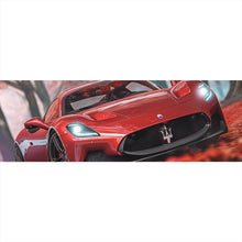 Lade das Bild in den Galerie-Viewer, Leinwandbild Roter Sportwagen fährt durch herbstlichen Wald No.2 Panorama