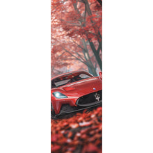 Lade das Bild in den Galerie-Viewer, Leinwandbild Roter Sportwagen fährt durch herbstlichen Wald No.2 Panorama Hoch