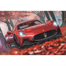 Lade das Bild in den Galerie-Viewer, Aluminiumbild gebürstet Roter Sportwagen fährt durch herbstlichen Wald No.2 Querformat