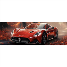 Lade das Bild in den Galerie-Viewer, Leinwandbild Roter Sportwagen fährt durch herbstlichen Wald Panorama