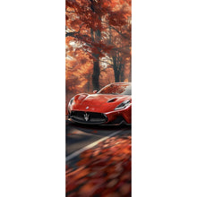 Lade das Bild in den Galerie-Viewer, Spannrahmenbild Roter Sportwagen fährt durch herbstlichen Wald Panorama Hoch