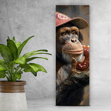 Lade das Bild in den Galerie-Viewer, Acrylglasbild Schimpanse genießt Donat Panorama Hoch
