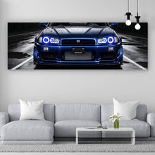 Lade das Bild in den Galerie-Viewer, Acrylglasbild Sportwagen auf nasser Straße bei Nacht Panorama