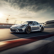 Lade das Bild in den Galerie-Viewer, Acrylglasbild Sportwagen auf Rennstrecke bei Sonnenuntergang Quadrat