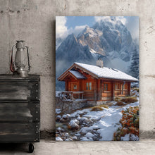 Lade das Bild in den Galerie-Viewer, Leinwandbild Winterliche Holzhütte vor majestätischen schneebedeckten Bergen Hochformat