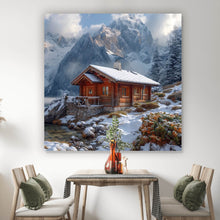 Lade das Bild in den Galerie-Viewer, Leinwandbild Winterliche Holzhütte vor majestätischen schneebedeckten Bergen Quadrat