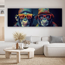 Lade das Bild in den Galerie-Viewer, Leinwandbild Zwei Affen mit Sonnenbrillen und bunten Hüten Panorama