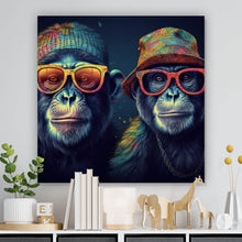 Lade das Bild in den Galerie-Viewer, Acrylglasbild Zwei Affen mit Sonnenbrillen und bunten Hüten Quadrat