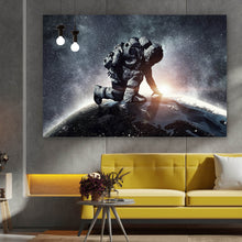 Lade das Bild in den Galerie-Viewer, Leinwandbild Astronaut touch the World Querformat