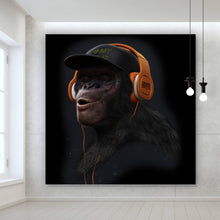 Lade das Bild in den Galerie-Viewer, Acrylglasbild Affe mit orangenen Kopfhörern Quadrat