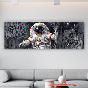 Leinwandbild Astronaut mit Planeten Ballons Panorama