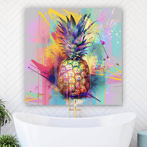 Spannrahmenbild Bunte Ananas mit knalligen Farbspritzer Hintergrund Quadrat
