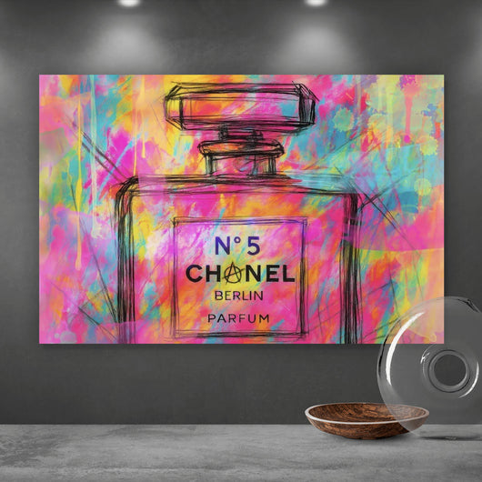Acrylglasbild Parfum vor farbenfrohem Hintergrund Querformat