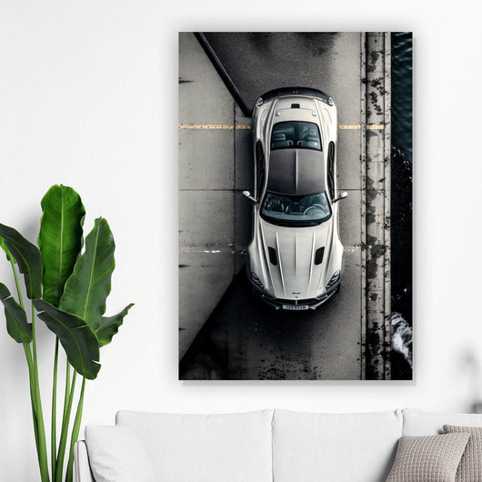 Leinwandbild Elegantes Auto auf Brücke mit Wasser im Hintergrund Hochformat