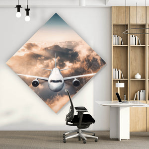 Leinwandbild Flugzeug über beeindruckender Berglandschaft Raute