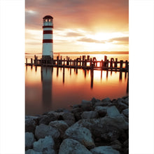 Lade das Bild in den Galerie-Viewer, Poster Leuchtturm am Meer in der Abenddämmerung Hochformat
