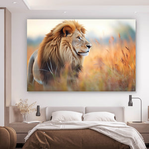 Leinwandbild Majestätischer Löwe in natürlicher Umgebung Querformat