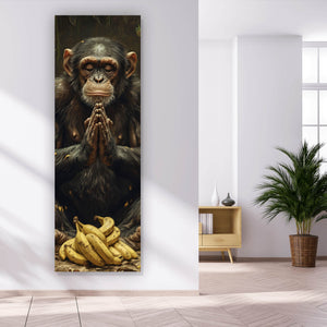Leinwandbild Meditierender Schimpanse mit Bananen Panorama Hoch
