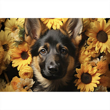 Lade das Bild in den Galerie-Viewer, Leinwandbild Niedlicher Schäferhund umgeben von gelben Blumen Querformat
