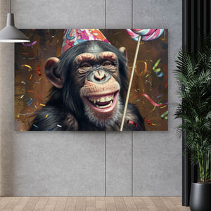 Spannrahmenbild Schimpanse feiert mit Lutscher und Partyhut Querformat