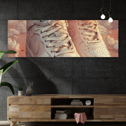 Leinwandbild Weiße Sneaker schweben über Wolken und Rosenblättern Panorama