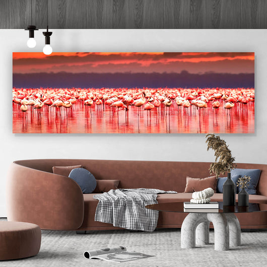 Leinwandbild Afrikanische Flamingos im See Panorama