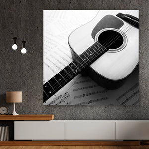 Leinwandbild Akustik Gitarre auf Noten Quadrat