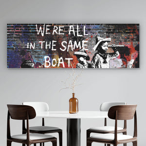 Spannrahmenbild Banksy - We're all in the same boat Panorama