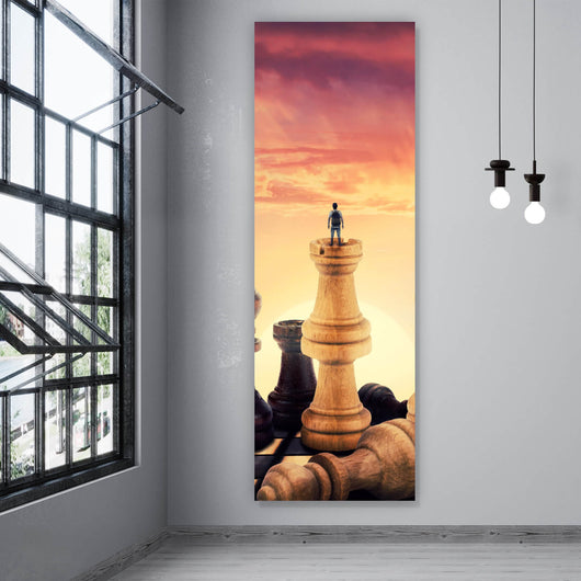Leinwandbild Gigantische Schachfiguren vor Sonnenaufgang Panorama Hoch
