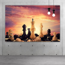 Lade das Bild in den Galerie-Viewer, Acrylglasbild Gigantische Schachfiguren vor Sonnenaufgang Querformat
