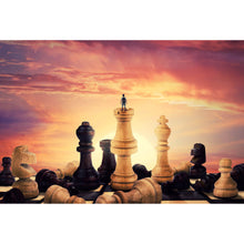 Lade das Bild in den Galerie-Viewer, Leinwandbild Gigantische Schachfiguren vor Sonnenaufgang Querformat

