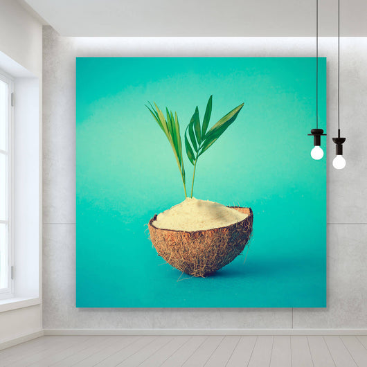 Leinwandbild Kokosnuss mit Palmenblätter Quadrat