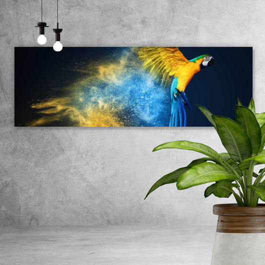 Leinwandbild Papagei über bunter Farbexplosion Panorama
