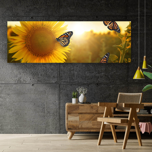 Leinwandbild Schmetterlinge im Sonnenblumenfeld Panorama