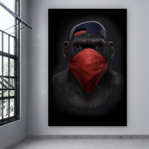 Spannrahmenbild Affe mit rotem Tuch Hochformat