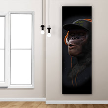 Lade das Bild in den Galerie-Viewer, Acrylglasbild Affe mit orangenen Kopfhörern Panorama Hoch
